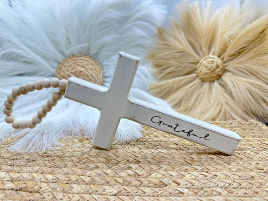Rustic White Cross to honor strength and gratitude.
